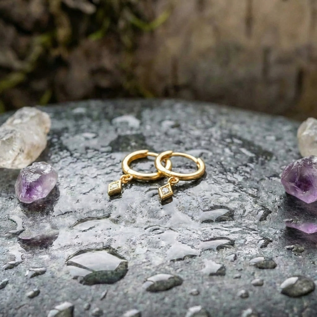 An Elegant Minimalist Gold Drop Huggie Earring Set