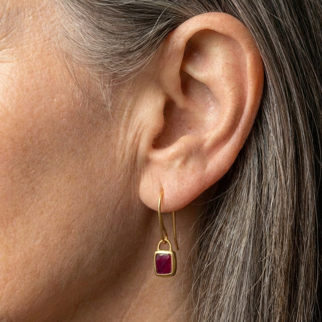 An Elegant Purple Gem Drop Earrings