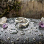 A Silver Adjustable Hug Ring