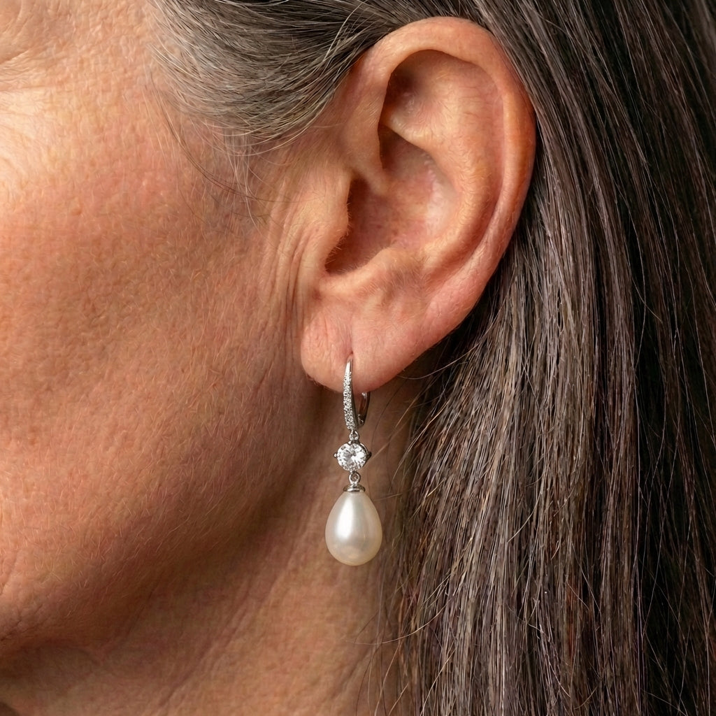 Bright Dangling Pearl Earrings