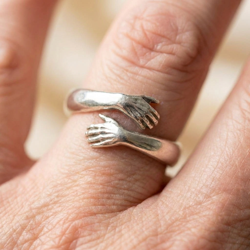 A Silver Adjustable Hug Ring
